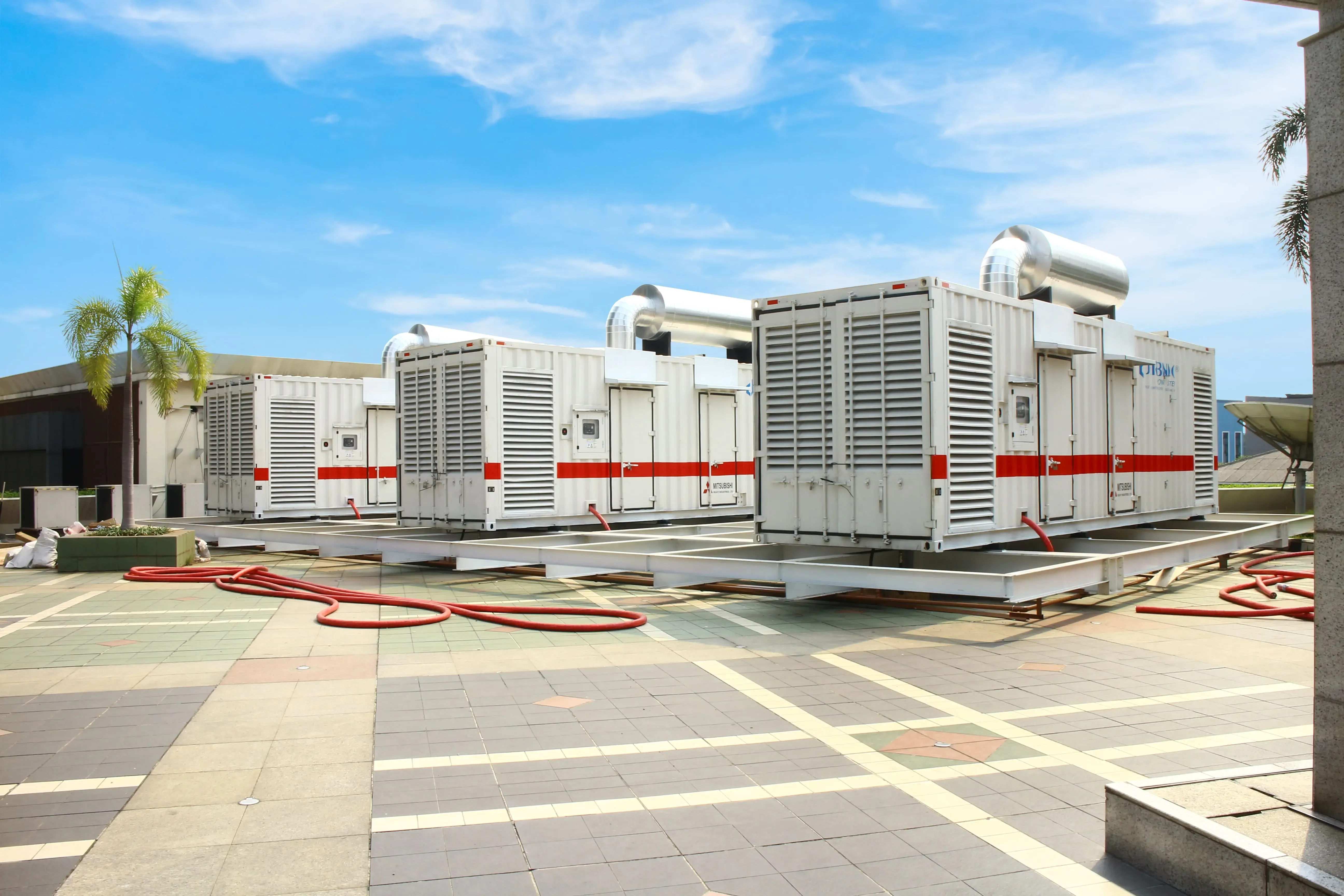 Silent-type generator sets providing standby power for a commercial facility